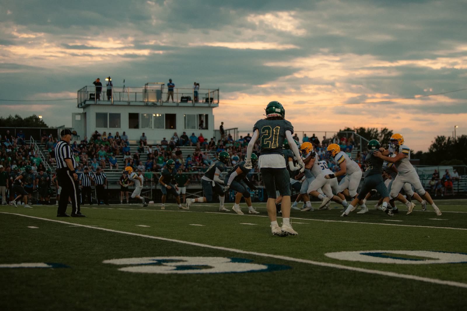 high school football field at night