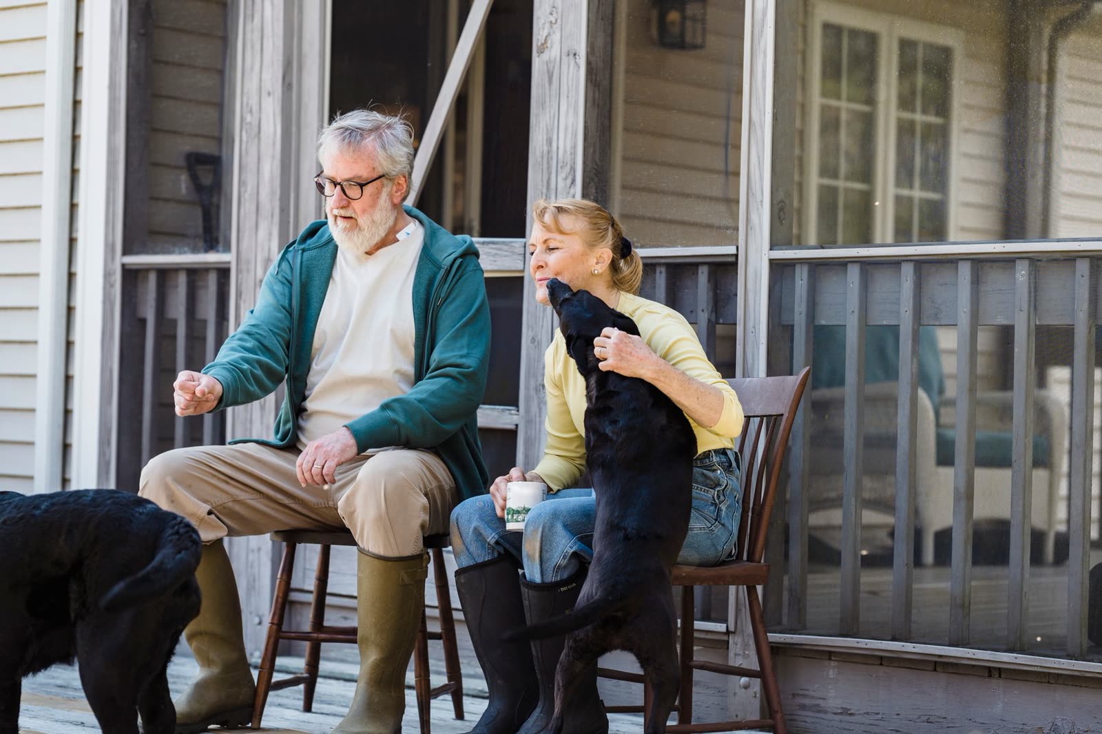 people in light jackets walking a riverside trail on a cool morning / family with coffee on a porch on a crisp early autumn morning / golden sunrise over a small southern town in early fall